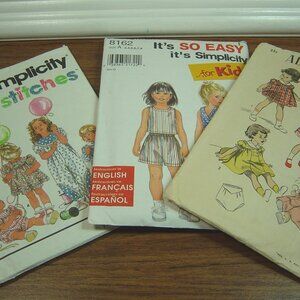 3 sewing patterns for little girls clothing--one is vintage
